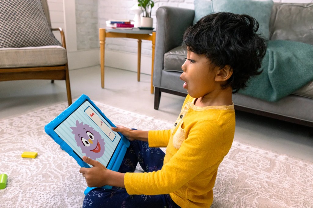 Parent and child using tablet for learning